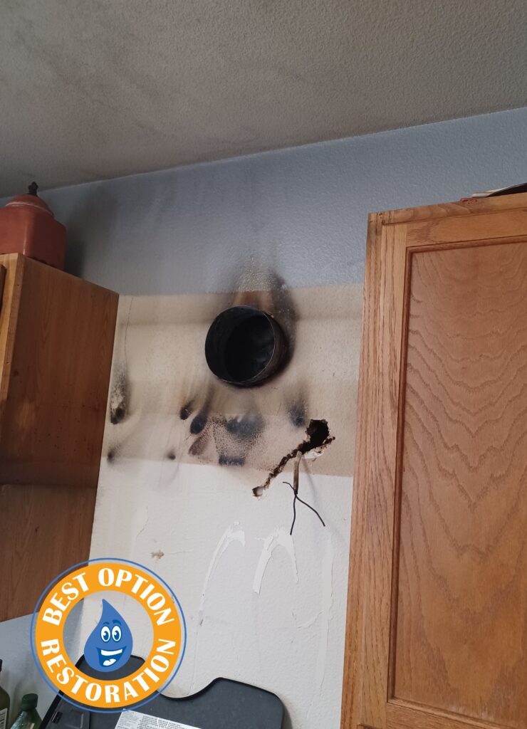 smoke damage behind stove vent